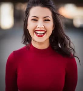 Woman wearing a red sweater